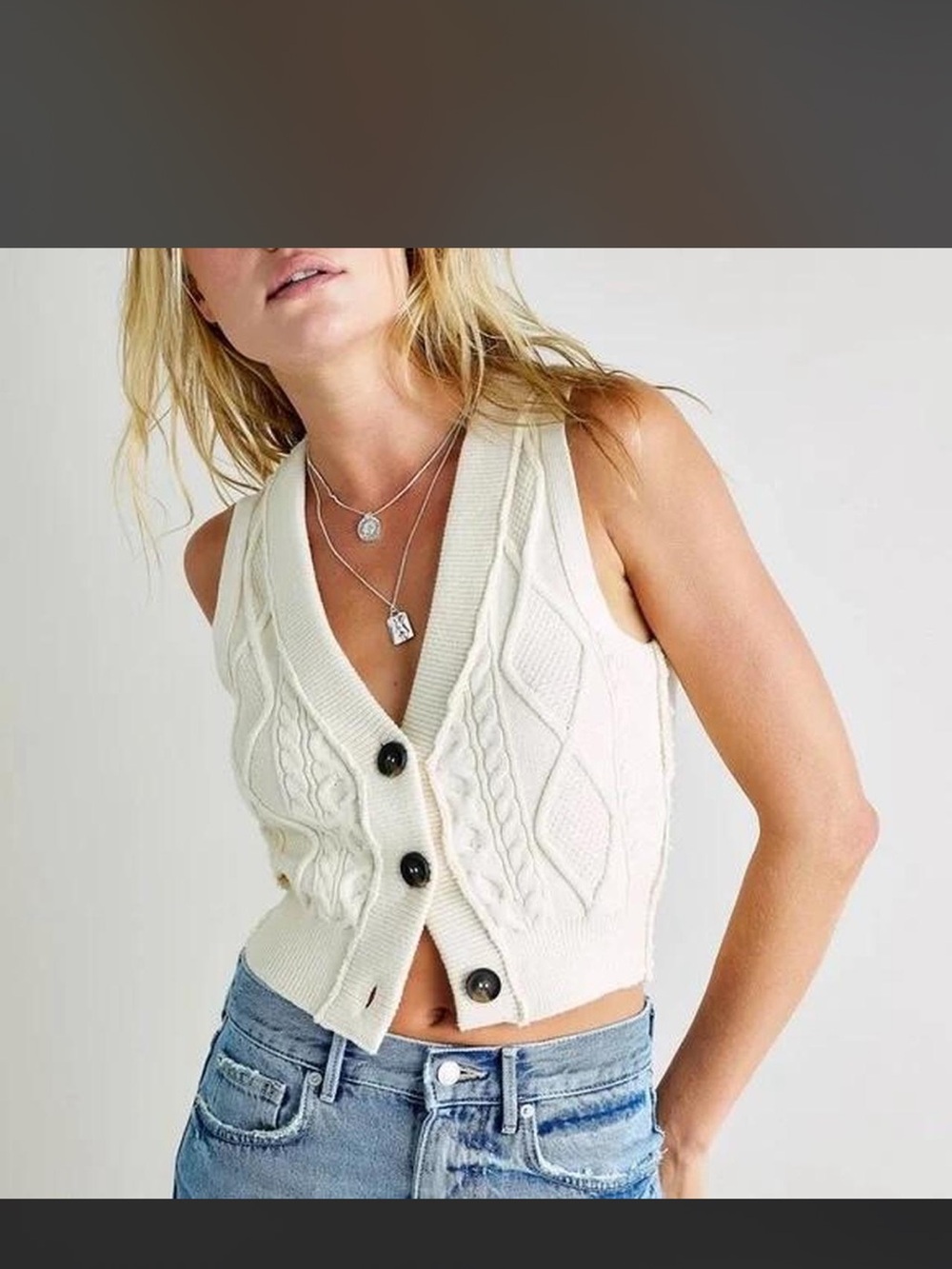 Sleeveless Cable-Knit Button Front Sweater Vest in Cream